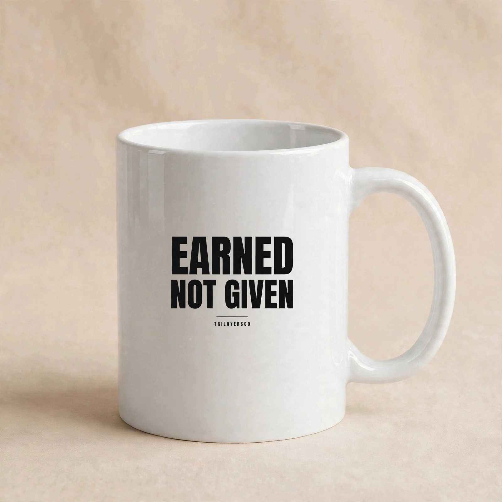 Earned Not Given mug for the morning desk routine